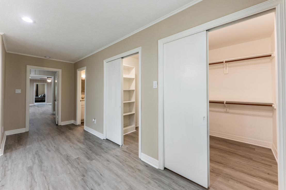 Two walk-in closets in primary bedroom.