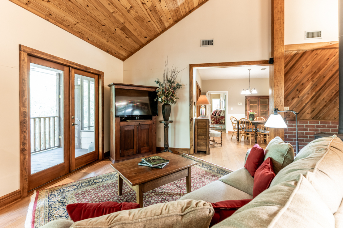 Living opens to Breakfast room & Outdoor Porches.